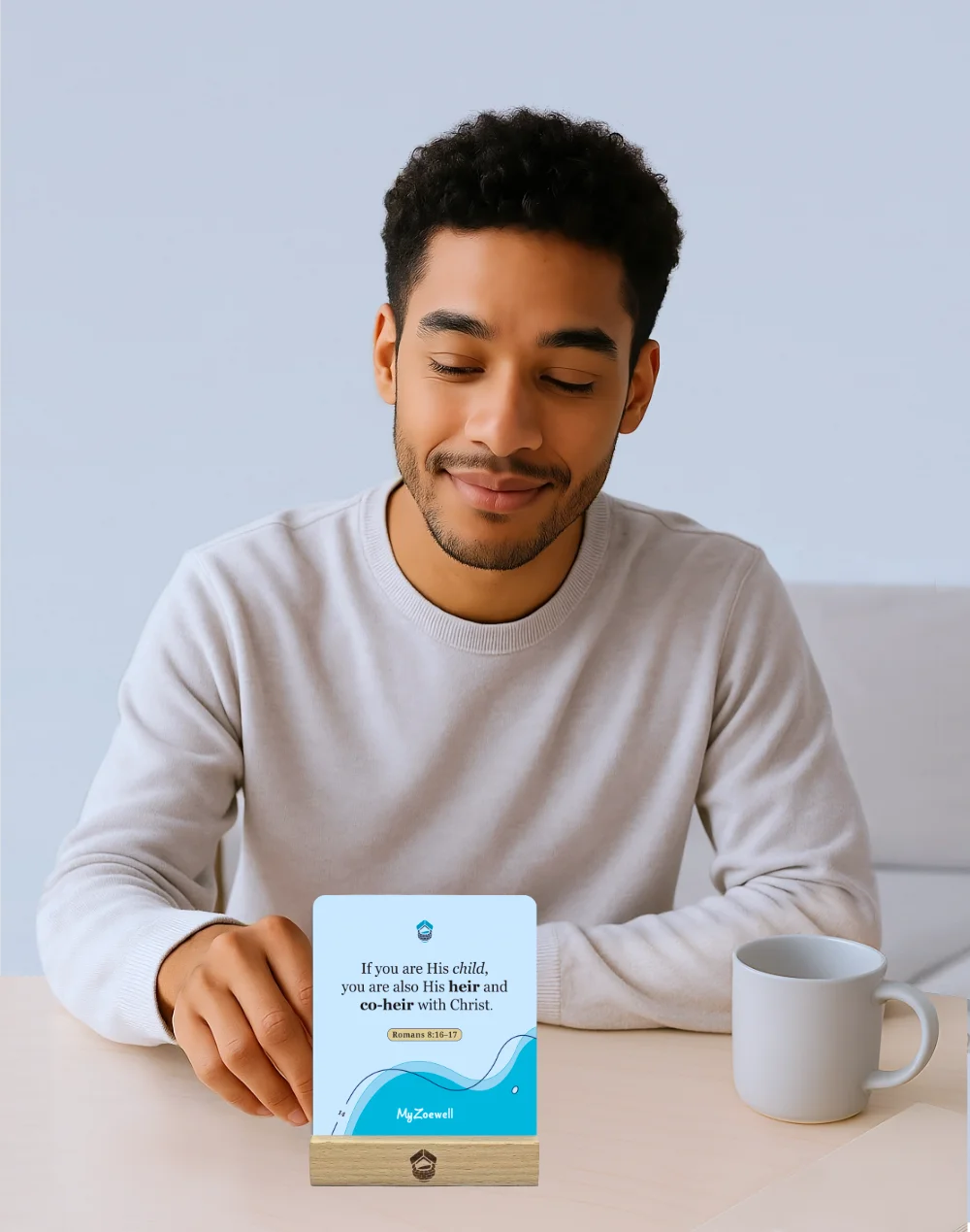 Identity in Christ Affirmations card displayed by black man with curly hair using enclosed card display stand